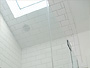 Shower door and skylight installed