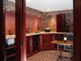 Wine cellar cabinets and brick tile